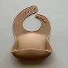 Solid Silicone Bib in Biscuit by Rommer